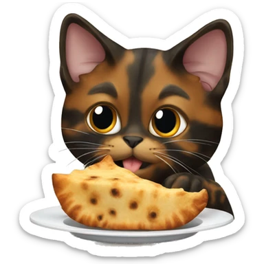 tortoiseshell cat eating sticker