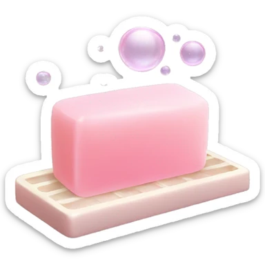 Light pink soap bar sitting on a soap holder, with soap bubbles  sticker