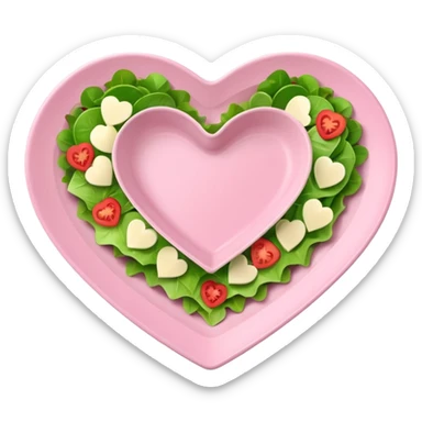 green salad in a light pink heart shaped plate sticker