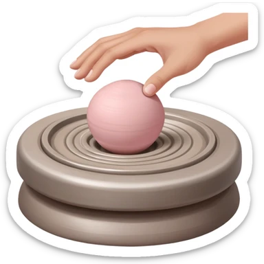 hand hovering over a centered pink ball of clay on a silver pottery wheel, not touching it yet, sensing position before contact sticker