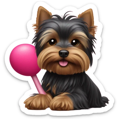 Black Yorkshire terrier playing with flamingo toy sticker