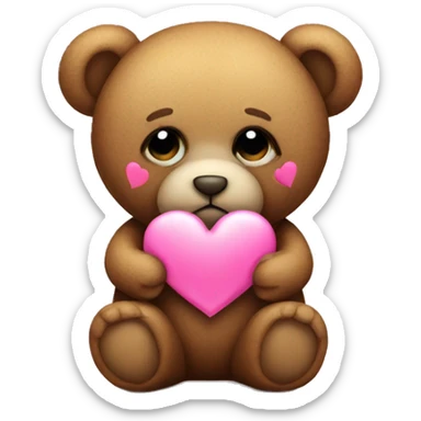 Teddy bear with sad eyes holding a pink heart sticker