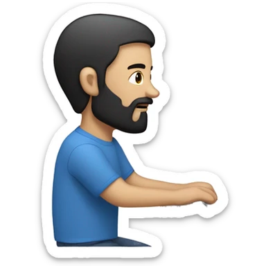 white guy with beard black hair up thin face typing in laptop wearing blue t-shirt sticker
