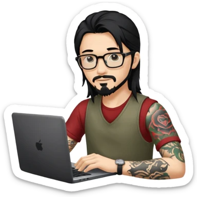 a young man with long black hair, with goatee, wearing glasses sitting with a laptop, tattoo inyout arms sticker