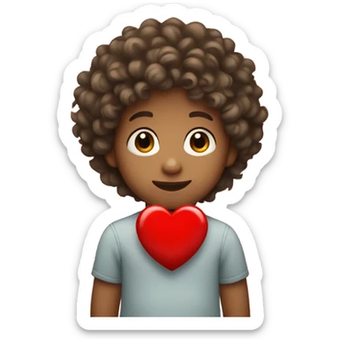 Little boy with curly hair light skinned holding a red heart sticker