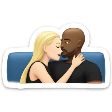 Blonde woman with blue eyes and long straight hair wearing a short black dress and a black man who is bald with a goatee seated together on a sofa enjoying a loving kiss.   sticker