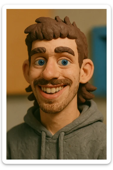 20 year old man, short scruffy beard and thin moustache, brown puffy mullet, blue eyes, big smile, white teeth, big lips, pronounced jaw, hair longer in back, sticking up on top, thin face, grey hooded sweatshirt, blue eyes sticker