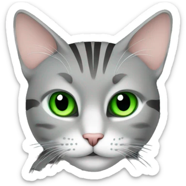A striped grey cat with green eyes is lying on the keyboard of the computer sticker