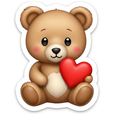 A teddy bear with a red heart sticker