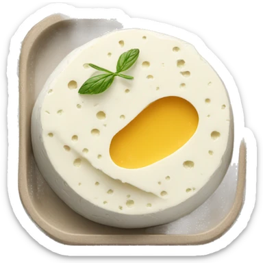 white cheese spread in a tray with herb sticker