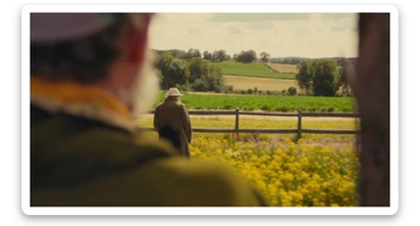 "Two shot" of a person in the foreground, blurred plants in the foreground (frame within a frame), a wooden fence and colorfull flowers in the midground, Poland, rolling hills in the background, cinematic depth of field, layered composition, natural lighting sticker