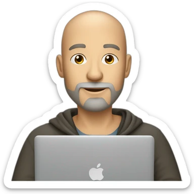 A 44-year old white male developer with shaved head and gray beard sitting with macbook sticker