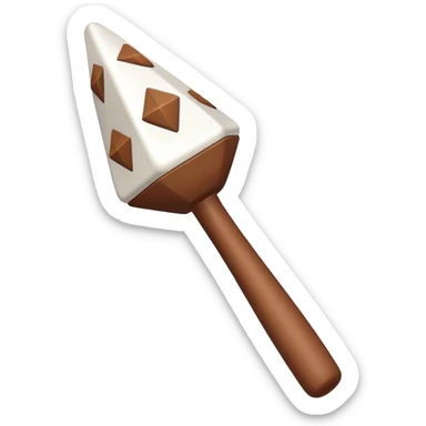 White rattle with triangles drawn on it in brown but filled in white sticker