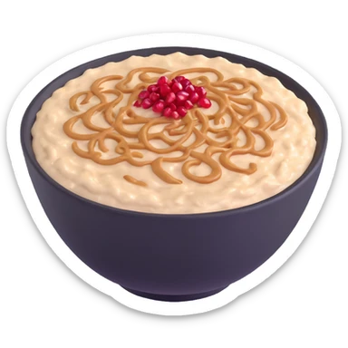bowl of creamy oatmeal topped with swirls of peanut butter, shredded coconut, and ruby red pomegranate seeds sticker