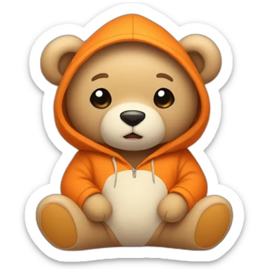 A cute light-beige teddy bear wearing an orange hoodie. His eyes are black. He's sitting on his butt. sticker