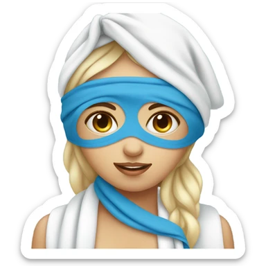 Girl wearing towel and blue eye masks in face sticker