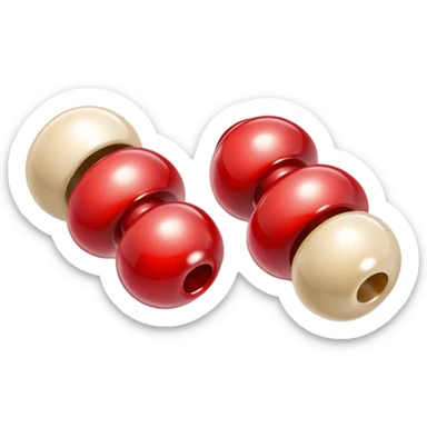 a pair of magatama (comma-shaped jewel beads) on top of one another in red and beige isometric view sticker
