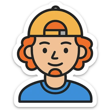 A boy with a backward cap, curly orange hair, and a goatee sticker