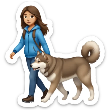 A girl with long brown hair walks an Alaskan sticker