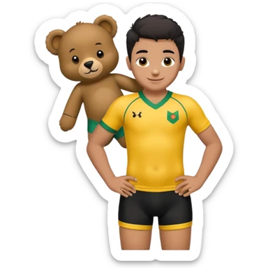 Une garçon qui a les cheveux noir qui sourit il a un maillot de l’algerie et qui a un doudou sur son epaule un ours jaune qui a des habille noir sticker