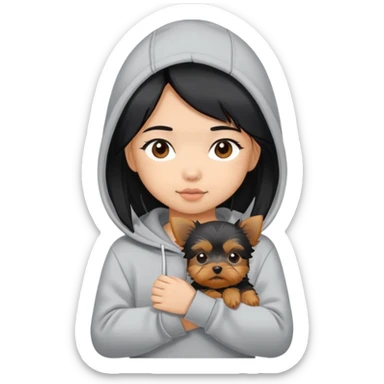 a black-haired asian girl wearing a grey hoodie with a yorkie puppy sticker