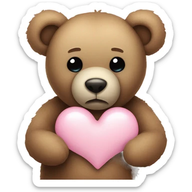 Teddy bear with sad eyes holding a pastel pink heart sticker