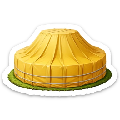 a mound of yellowish pressed silage, covered by plastic sheeting, but uncovered on one side sticker