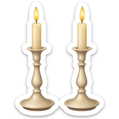 two pale beige candles in candlesticks sticker