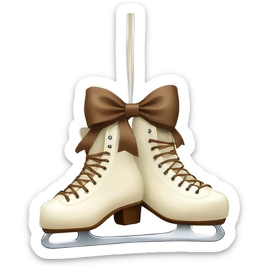 Cream color pair of ice skates hanging from a brown bow sticker