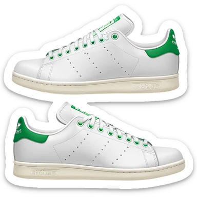 Pair of Adidas Stan Smith sneakers in white and green colorway, one positioned behind the other, both shoes shown from side angle sticker