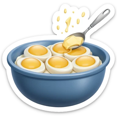 mixing bowl with uncracked eggs and butter sticker