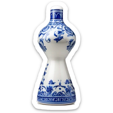 The Clase Azul Tequila bottle is tall and hourglass-shaped, with a wide base that tapers towards the neck. Its white ceramic body is decorated with cobalt blue floral designs, and it’s topped with a complete gray, bell-shaped stopper that curves inward  sticker