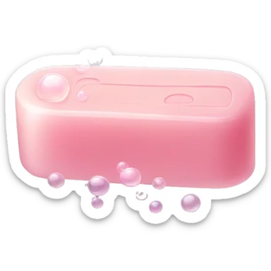 Light pink soap bar sitting on a soap holder, with soap bubbles  sticker