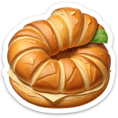 meat.A group of baked goods: a round bread roll beside a small croissant on a warm golden background. sticker