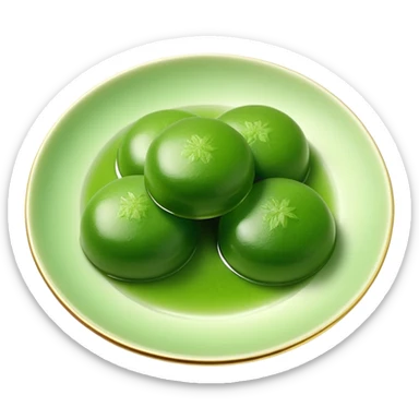 four green spherical warabi mochi on the plate sticker