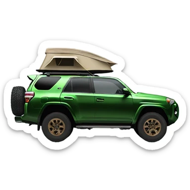 Green 4runner with bronze wheels and a rooftop tent sticker