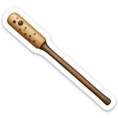 A stick with a khaki dot sticker