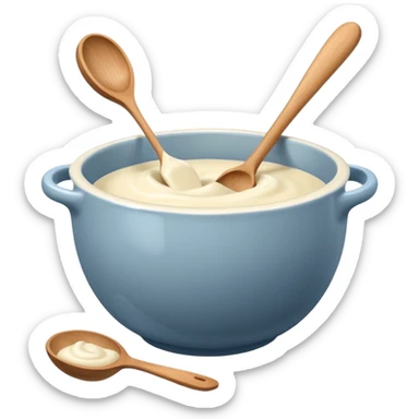 a cream ceramic mixing bowl with a wooden spoon stirring sticker