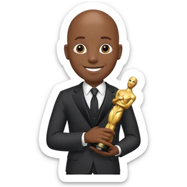 smiling bald black man in suit holding an Oscar sticker