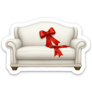 A soft white sofa tied with a red bow sticker