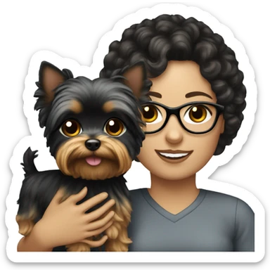 A White girl with curly black hair and glasses holding a Yorkie  sticker