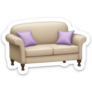 Delicate beige sofa with a light purplebedspread and a pillow sticker