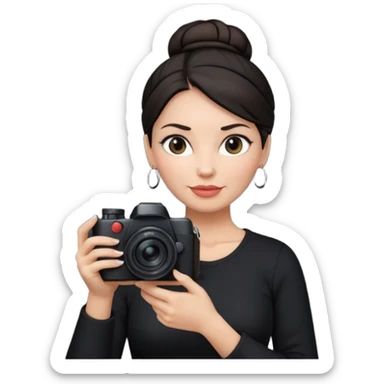 48 year old woman photographer with dark hair in a bun, wearing black clothes sticker