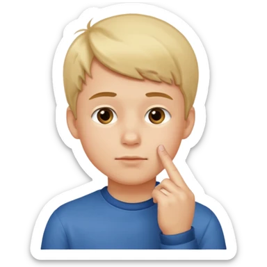 Boy putting his finger on the edge of his chin sticker