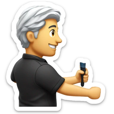 Technician with grey hair wearing a black polo shirt fixes a TV to a white wall of an exhibition Booth using a screwdriver sticker