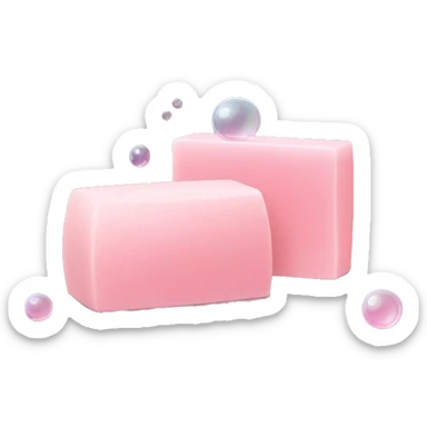 Light pink soap bar sitting on a soap holder, with soap bubbles  sticker