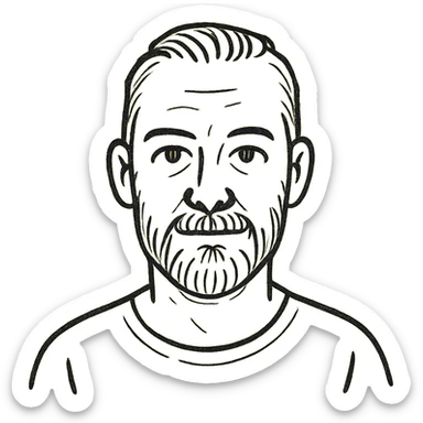 A middle-aged man with a medium slightly gray beard, short hair cut to the scalp on the sides and combed back on top, blue eyes sticker