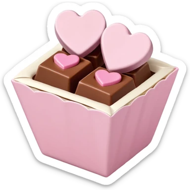 Two square milk chocolate , Each praline is a sharp-edged cube with smooth glossy chocolate coating, placed in a small white fluted paper candy cup. On top of each cube is a flat pastel pink heart-shaped icing sticker
