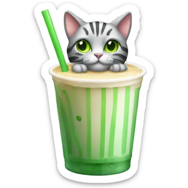 A striped grey cat with green eyes drinking boba sticker