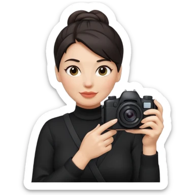middle aged woman photographer with dark hair in a bun, wearing black clothes sticker